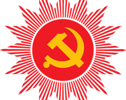 Red and yellow logo of the Communist Party of Nepal with a hammer and sickle surrounded by a sunburst design.